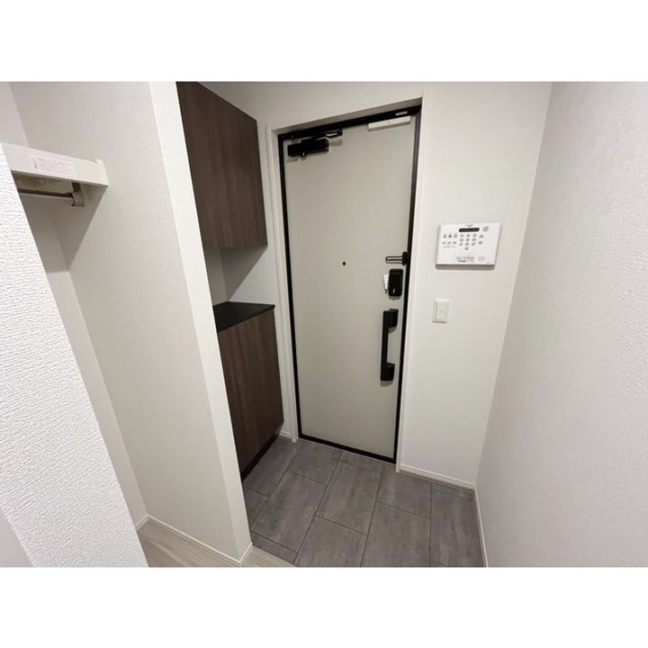 コラージュくりた207の玄関