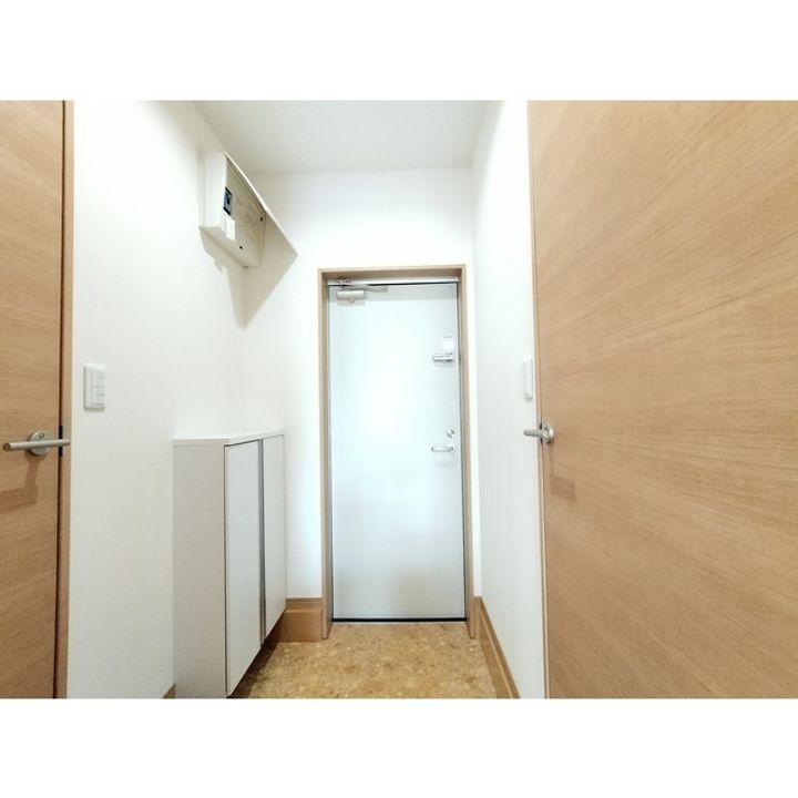 エスパシオ若葉104の玄関