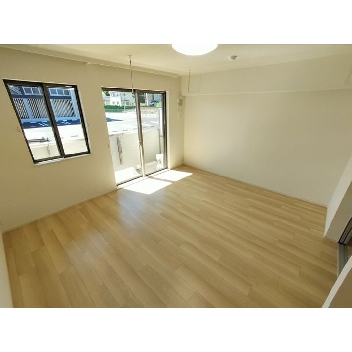 コンフォーティア南箕輪Ⅱ A棟103の居間