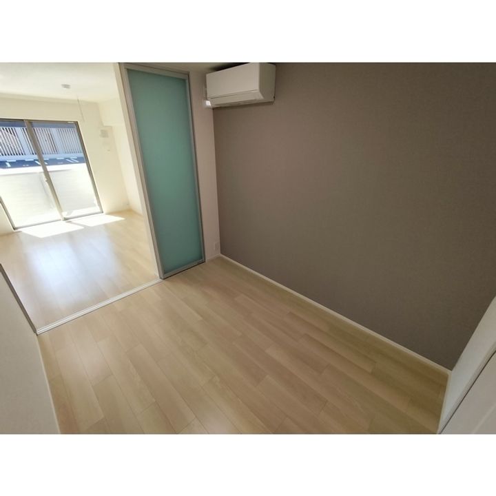 コンフォーティア南箕輪Ⅱ A棟103の居間