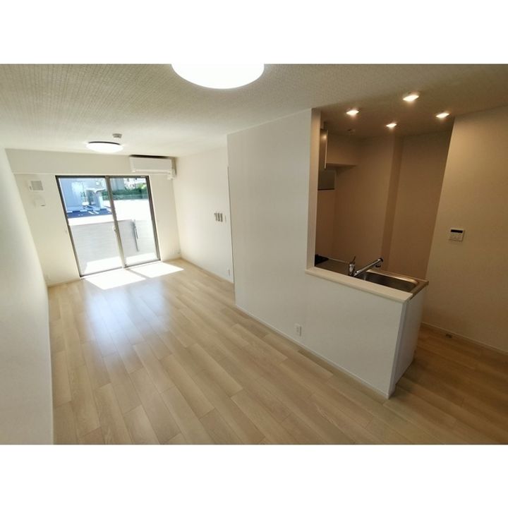 コンフォーティア南箕輪Ⅱ A棟105の居間