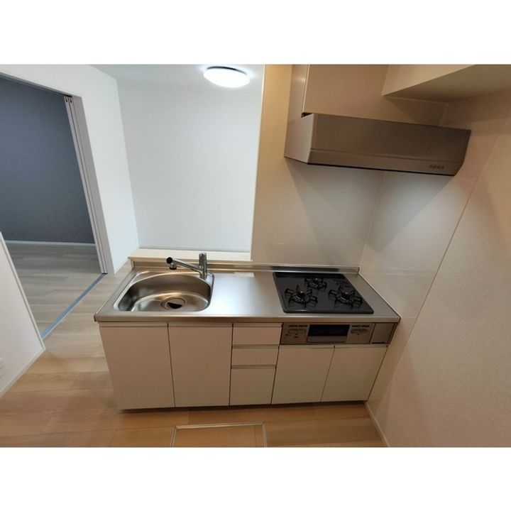 コンフォーティア南箕輪Ⅱ A棟105のキッチン