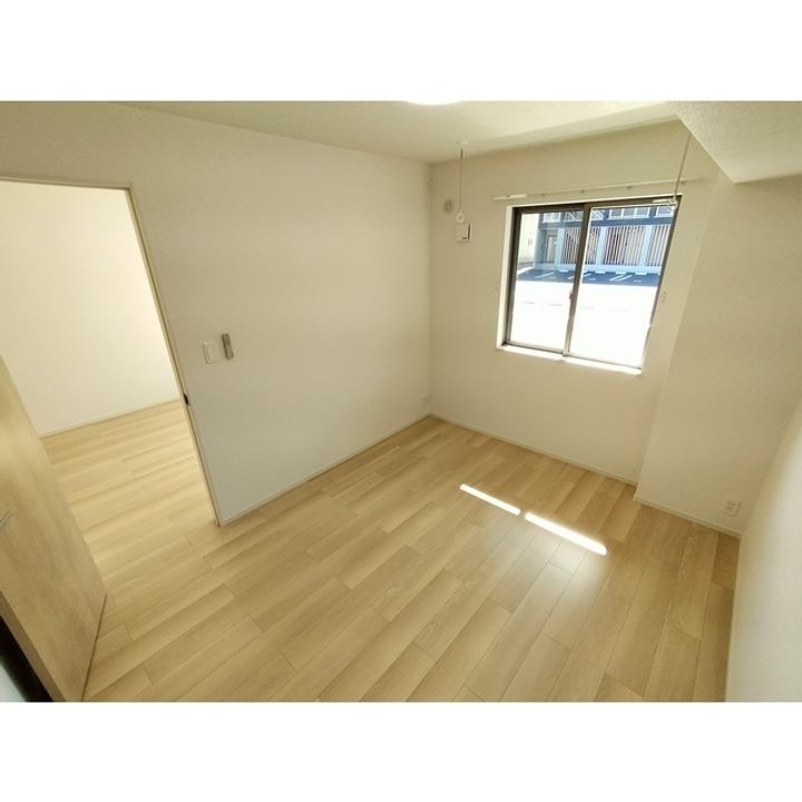 コンフォーティア南箕輪Ⅱ A棟105の居間