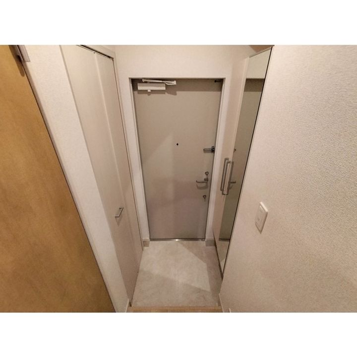 コンフォーティア南箕輪Ⅱ A棟105の玄関