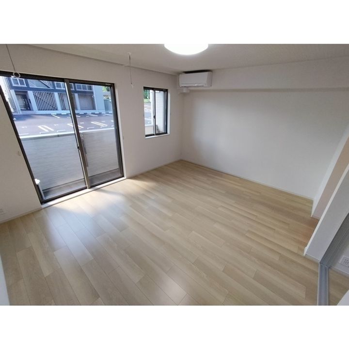 コンフォーティア南箕輪Ⅱ A棟202の居間