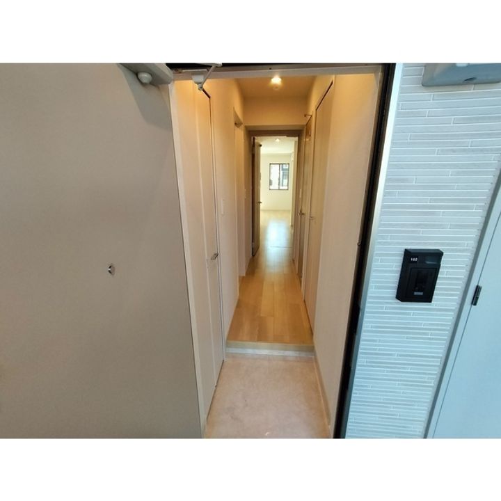 コンフォーティア南箕輪Ⅱ A棟202の玄関