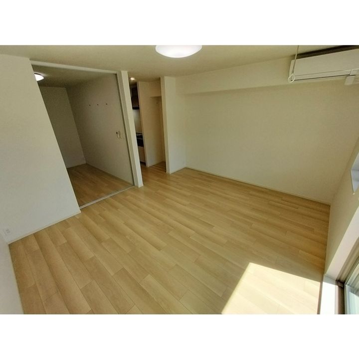 コンフォーティア南箕輪Ⅱ A棟303の居間