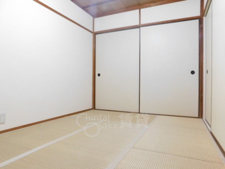 大阪府豊中市新千里南町3丁目の賃貸マンションの居間