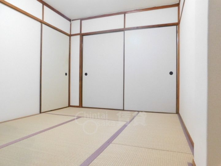 大阪府豊中市新千里南町3丁目の賃貸マンションの居間