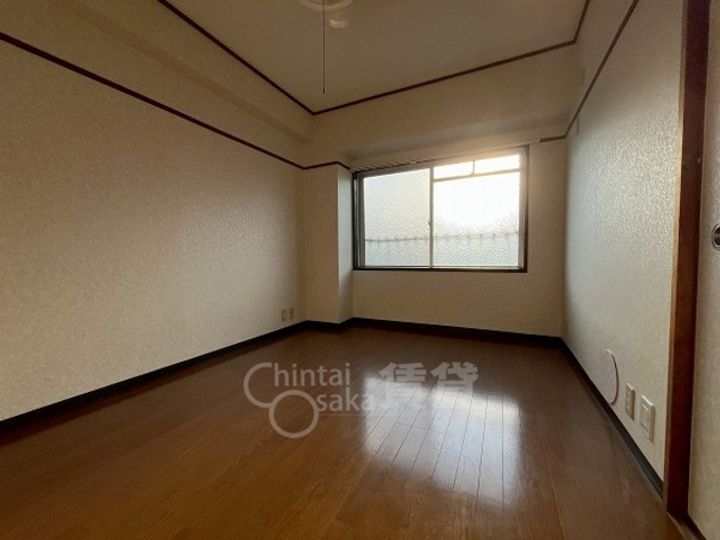 大阪府池田市八王寺1丁目の賃貸マンションの寝室