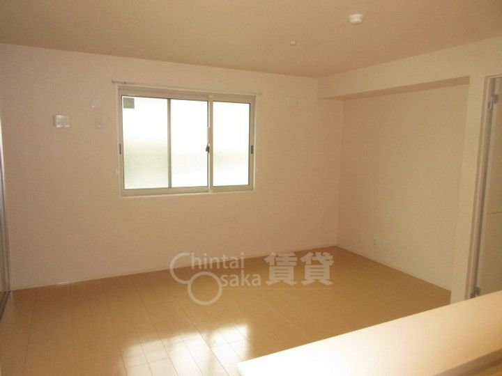 大阪府箕面市彩都粟生南3丁目の賃貸アパートの居間