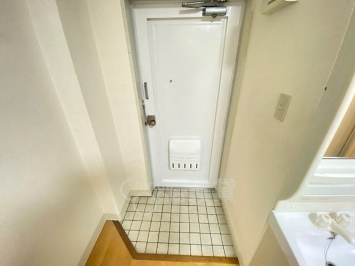 大阪府豊中市螢池西町1丁目の賃貸マンションの玄関