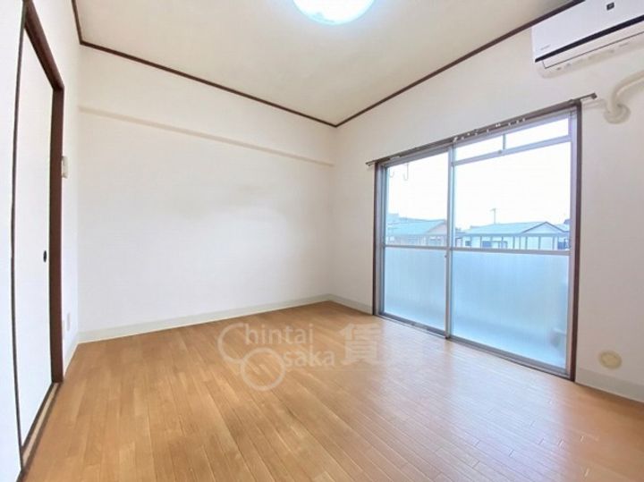 大阪府豊中市螢池西町1丁目の賃貸マンションの寝室