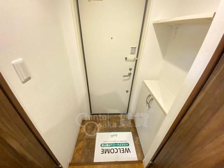 大阪府池田市井口堂2丁目の賃貸マンションの玄関