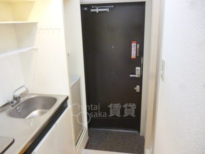 大阪府池田市井口堂2丁目の賃貸マンションの玄関