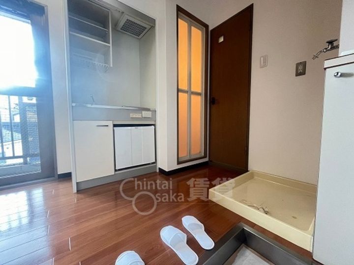 光陽川西マンションの玄関