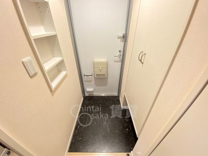 コンフォート刀根山の玄関