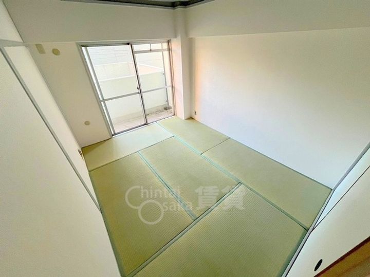 大阪府大阪市東淀川区豊新1丁目の賃貸マンションの居間