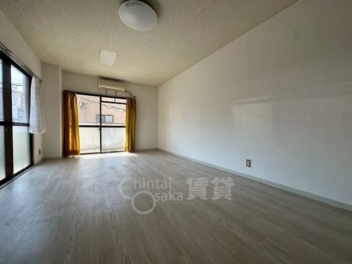 大阪府大阪市淀川区十三元今里2丁目の賃貸マンションの居間