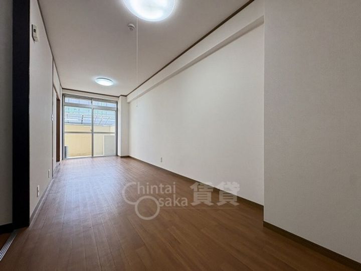 大阪府大阪市東淀川区豊新4丁目の賃貸マンションの居間