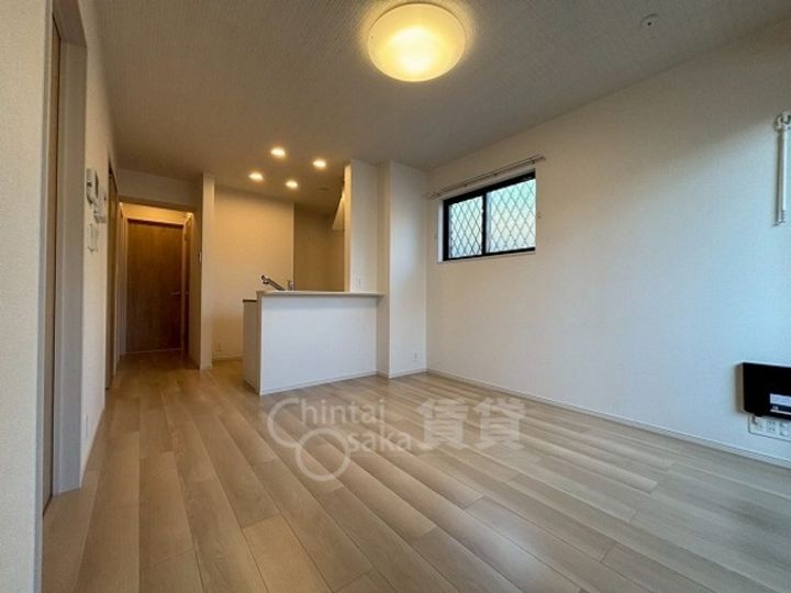 大阪府吹田市山田東3丁目の賃貸アパートの居間