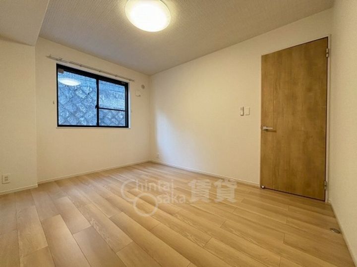 大阪府吹田市山田東3丁目の賃貸アパートの居間