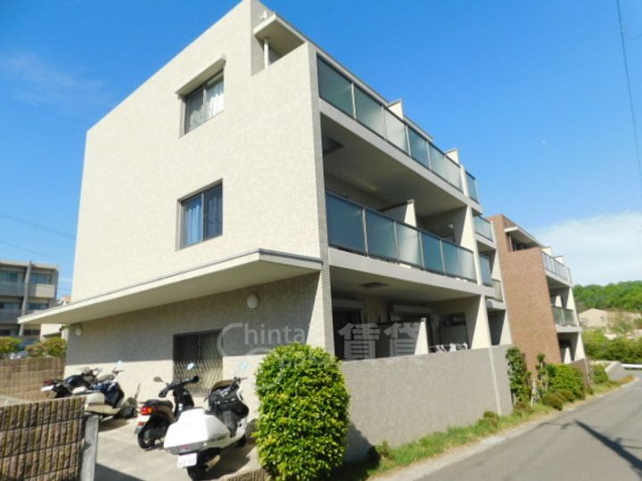 大阪府箕面市彩都粟生南1丁目の賃貸マンションの外観