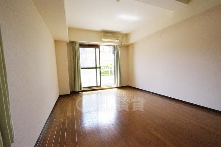 大阪府吹田市佐井寺3丁目の賃貸マンションの居間