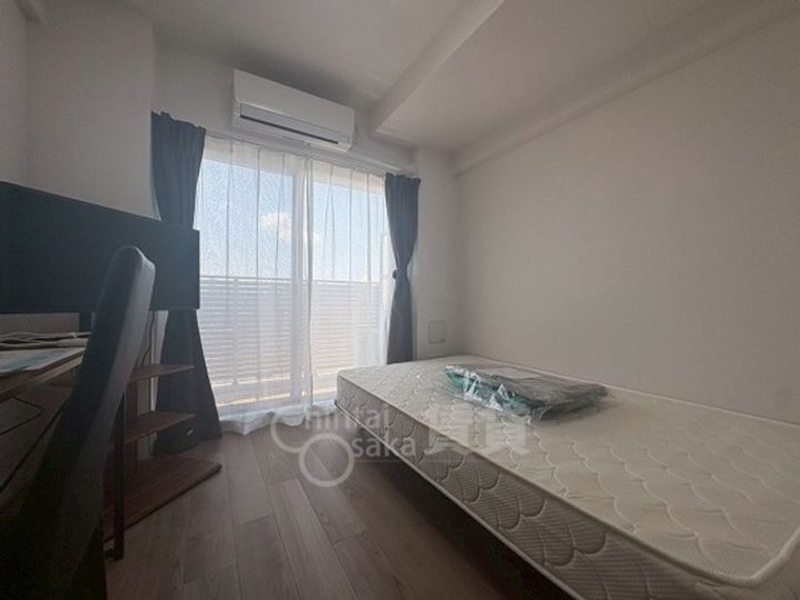 大阪府大阪市東淀川区東中島2丁目の賃貸マンションの居間