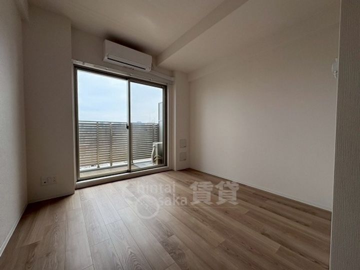 大阪府大阪市東淀川区東中島2丁目の賃貸マンションの居間