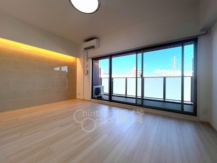 大阪府大阪市淀川区新高2丁目の賃貸マンションの居間