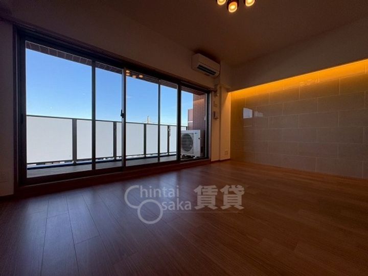 大阪府大阪市淀川区新高2丁目の賃貸マンションの居間