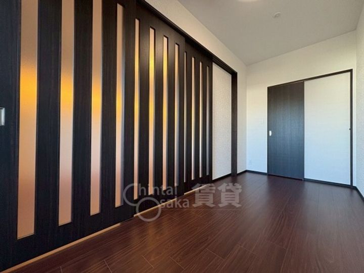 大阪府大阪市淀川区新高2丁目の賃貸マンションの居間