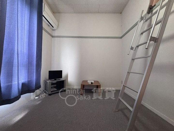 大阪府摂津市鳥飼上5丁目の賃貸マンションの居間