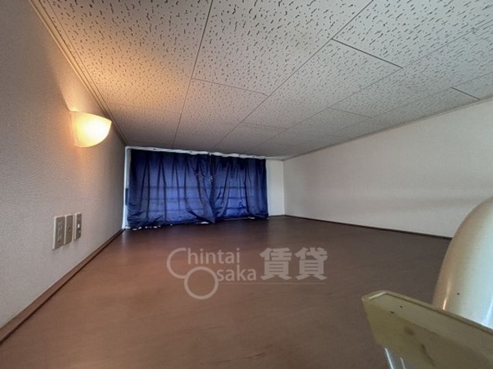 大阪府摂津市鳥飼上5丁目の賃貸マンションの居間