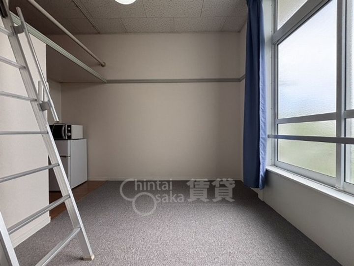 大阪府摂津市鳥飼上5丁目の賃貸マンションの居間