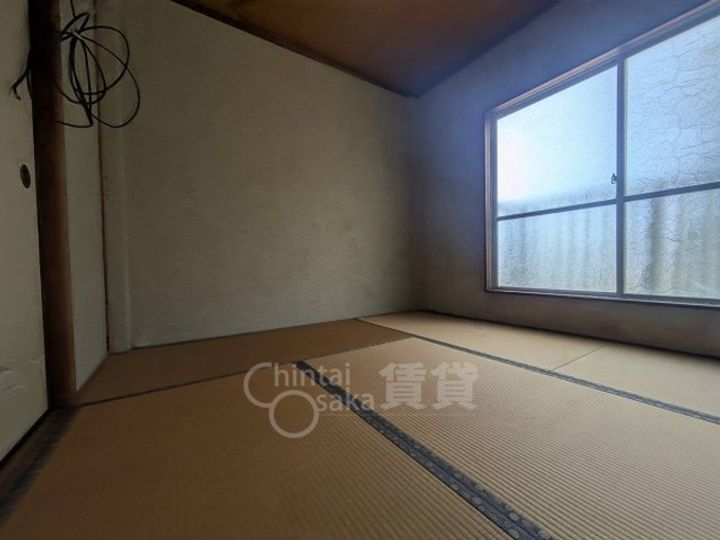 大阪府茨木市駅前4丁目の賃貸マンションの居間