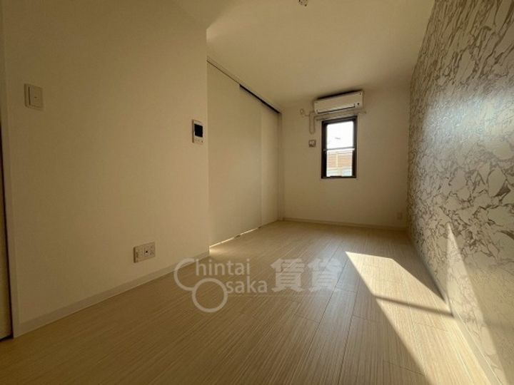 大阪府池田市石橋1丁目の賃貸マンションの居間