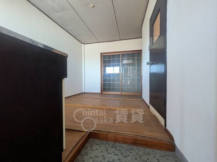 大阪府茨木市大池1丁目の賃貸マンションの玄関
