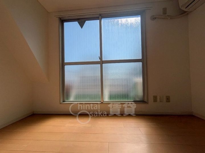 大阪府摂津市正雀本町1丁目の賃貸マンションの居間