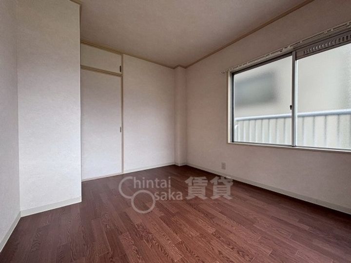 大阪府摂津市正雀本町1丁目の賃貸マンションの居間