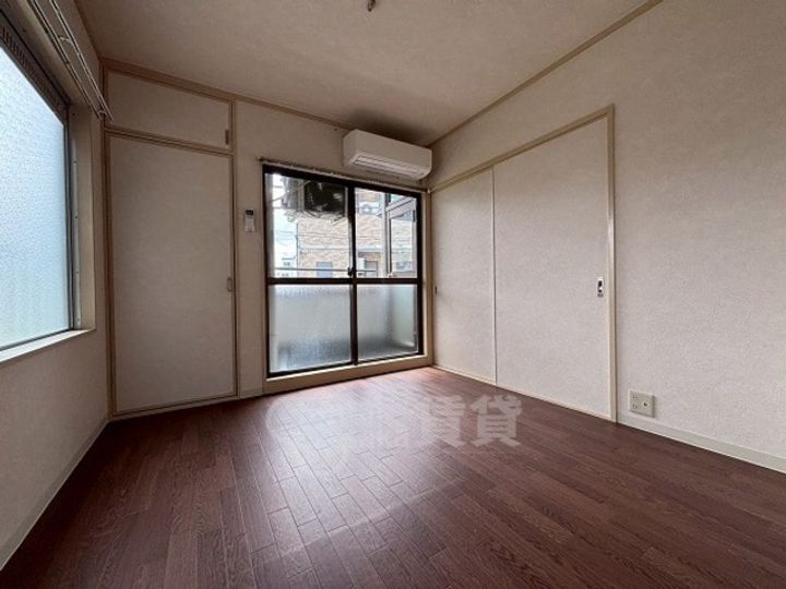 大阪府摂津市正雀本町1丁目の賃貸マンションの居間