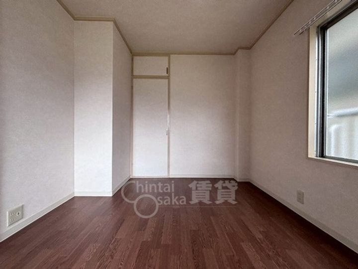 大阪府摂津市正雀本町1丁目の賃貸マンションの居間