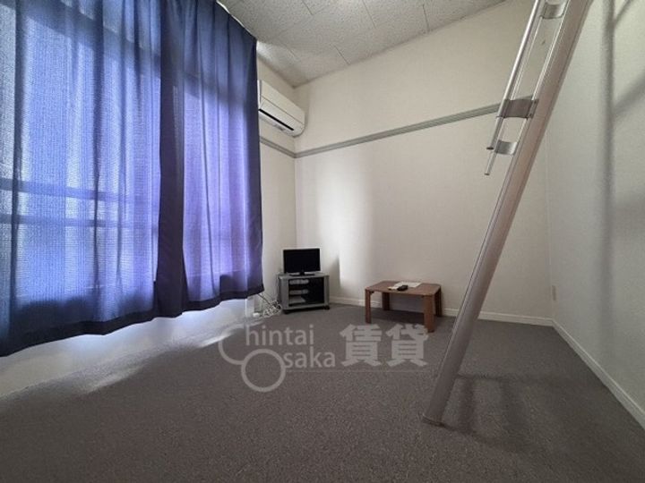 大阪府摂津市鳥飼上5丁目の賃貸マンションの居間