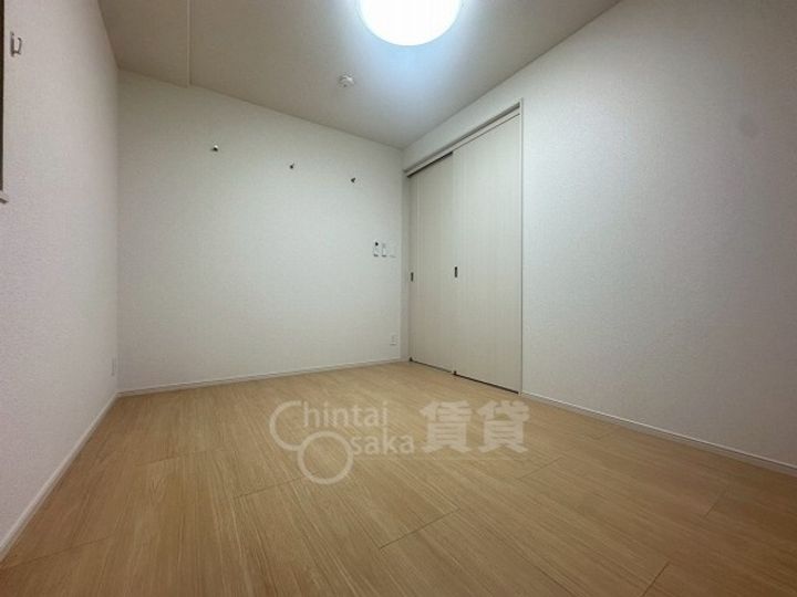 大阪府茨木市東奈良2丁目の賃貸マンションの居間