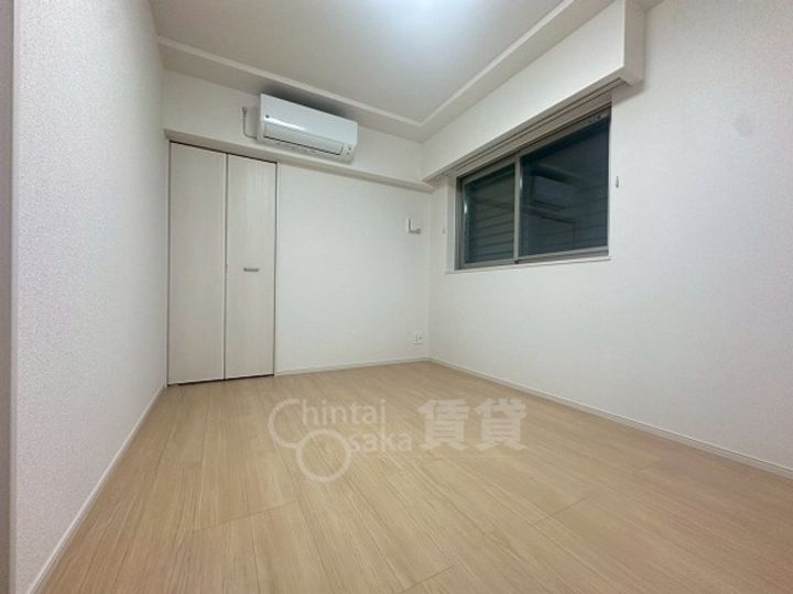 大阪府茨木市東奈良2丁目の賃貸マンションの居間