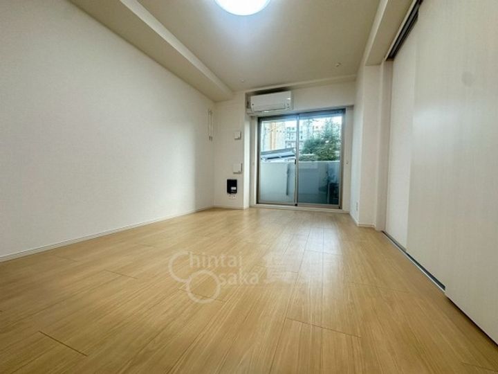 大阪府茨木市東奈良2丁目の賃貸マンションの居間