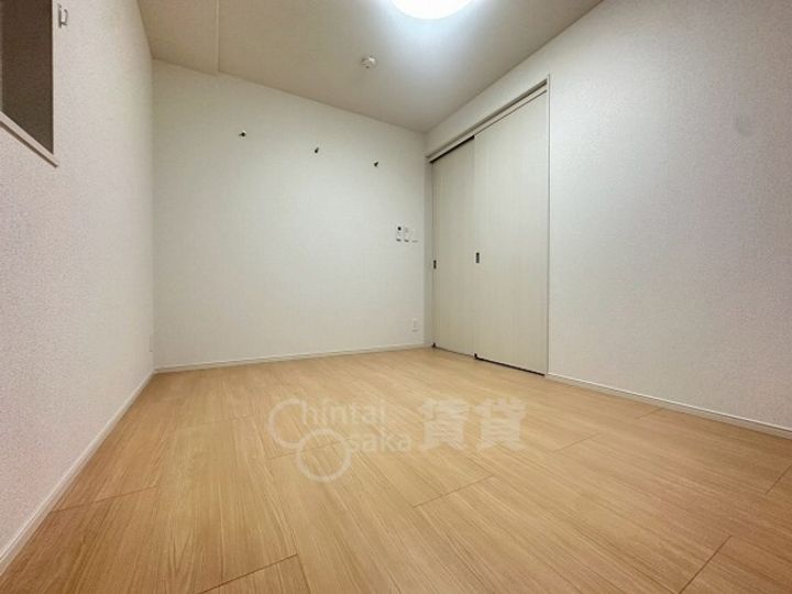 大阪府茨木市東奈良2丁目の賃貸マンションの居間