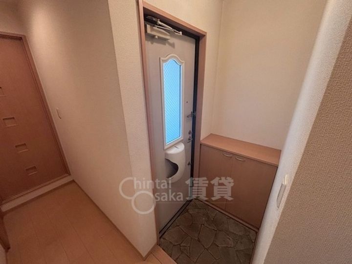 アウラ千里丘の玄関
