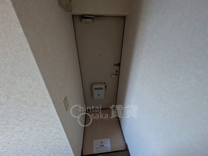 大阪府摂津市正雀4丁目の賃貸マンションの玄関